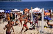 Travel photography:Playing futevôlei (footvolley) at Ipanema beach in Rio, Brazil