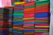 Travel photography:Scarfs for sale at the Battambang central market, Cambodia