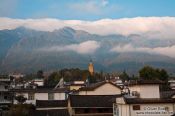 Travel photography:The golden Pagoda in Dali with mountains , China