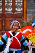 Travel photography:Naxi women performing a traditional dance in Lijiang, China