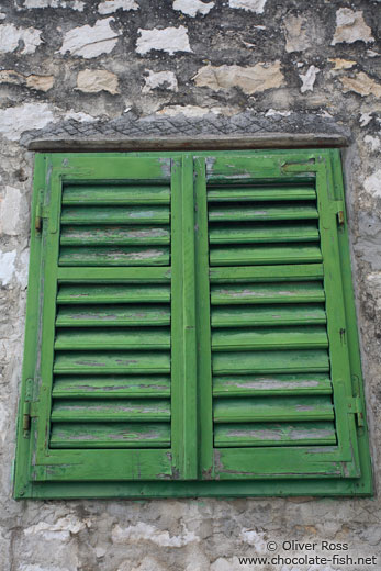 Green window shutters in Sibenik