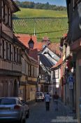 Travel photography:Street in Barr with vineyards in the background, France
