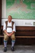 Travel photography:Man in traditional bavarian dress in Garmisch, Germany