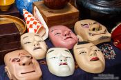 Travel photography:Masks for sale at Tokyo´s Antiques market, Japan
