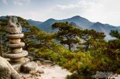 Travel photography:Seated stone Buddha at Yongjangsa in the Namsan mountains, South Korea