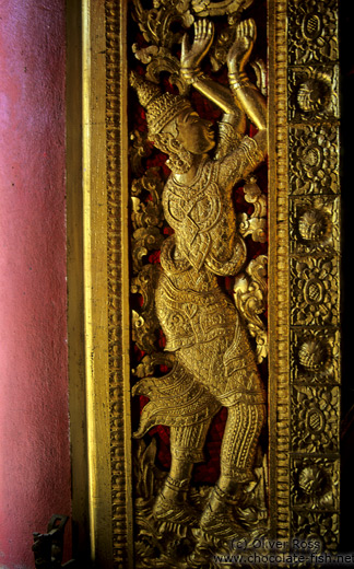 A window shutter inside the Haw Pha Bang temple in Luang Prabang