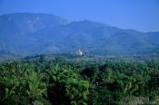 Travel photography:View of the Golden Temple from Wat Thammothayalan in Luang Prabang, Laos