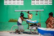 Travel photography:Seller on bike in Celestun, Mexico