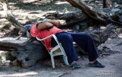 Travel photography:Chichen Itza man sleeping, Mexico