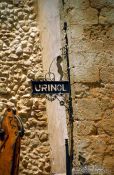 Travel photography:Please pee here ... open street urinal in Lisbon, Portugal