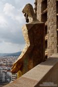 Travel photography:Sitting Christ sculpture symbolising the ascension of Christ on the Passion Facade of the Sagrada Familia, Spain