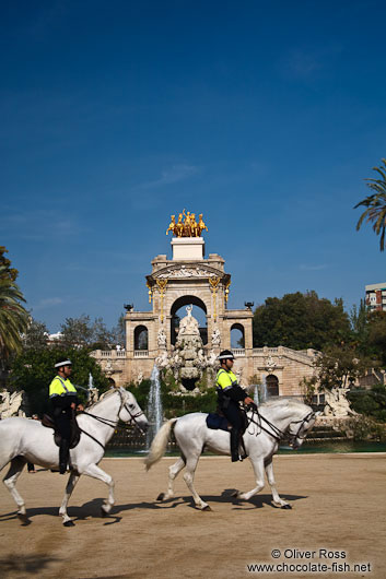 Mounted police patrol in front of the Cascada in Barcelona´s Parc de la Ciutadella