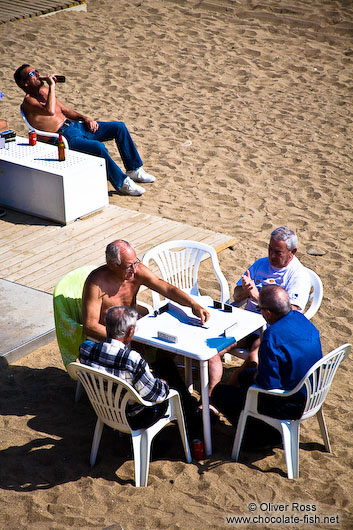 barcelona beach pictures. Men at Barcelona beach