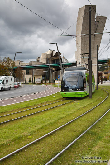 Bilbao tram with the Guggenheim museum in the background