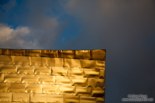 Evening light hits the facade of the Bilbao Guggenheim Museum