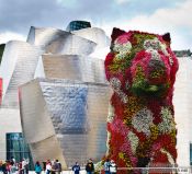 Travel photography:The Jeff Koons Dog sculpture outside the Bilbao Guggenheim Museum, Spain