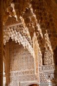 Travel photography:Arches in the Patio de los Leones (Court of the Lions) of the Nazrin palace in the Granada Alhambra, Spain