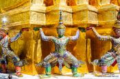 Travel photography:Golden demon sculptures at Wat Phra Kaew, the Bangkok Royal Palace, Thailand