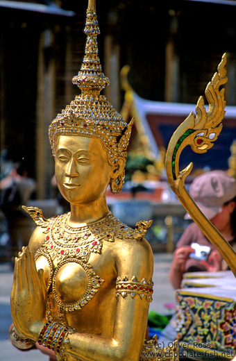 Golden Kinnara figure at Wat Phra Kaew in Bangkok