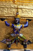 Travel photography:Demon figure at Wat Phra Kaew in Bangkok, Thailand