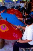 Travel photography:Painting parasols at the Bo Sang parasol factory, Thailand