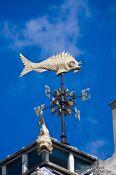 Travel photography:Golden fish weather vane in London, United Kingdom, England