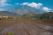 Travel photography:Rice fields near Sapa with Fansipan mountain in the background, Vietnam