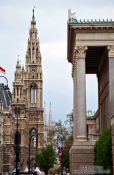Travel photography:Vienna city hall (left) with Votivkirche (back) and parliament (right), Austria