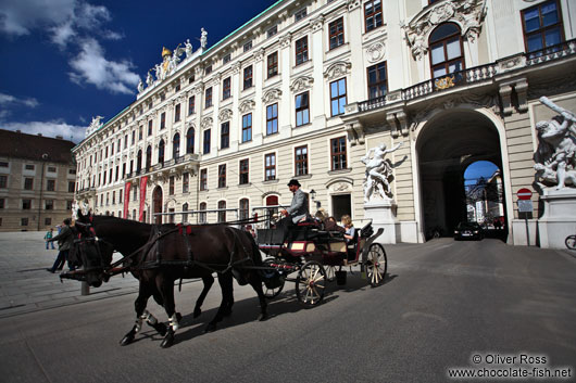A Fiaker (horse cart for tourists) in Vienna´s  Hofburg