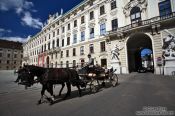 Travel photography:A Fiaker (horse cart for tourists) in Vienna´s  Hofburg, Austria