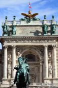 Travel photography:Neue Burg with statue of Prince Eugene of Savoy in Vienna´s Hofburg, Austria