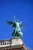 Travel photography:Vienna Hofburg angle statue atop the Neue Burg, Austria