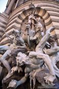 Travel photography:The Macht-zur-See fountain at the Michaeler square outside the Hofburg, Austria