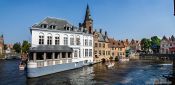 Travel photography:Houses along a canal in Bruges, Belgium