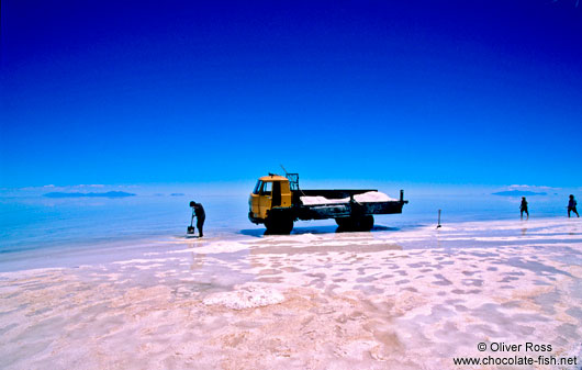 Salt harvest in the flooded Salar de Uyuni