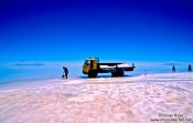 Travel photography:Salt harvest in the flooded Salar de Uyuni, Bolivia