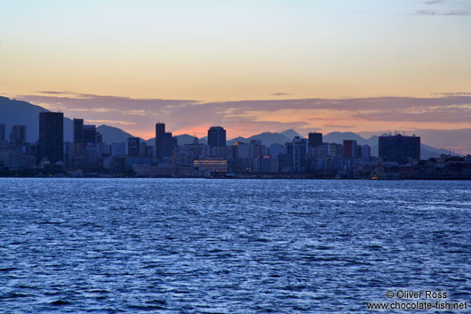 Rio´s city centre after sunset viewed from the water