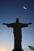 Travel photography:Silhouette of the Christ statue on top of Corcovado, Brazil