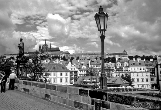 Houses along the Lesser Quarter with castle at the top, viewed from Charles bridge