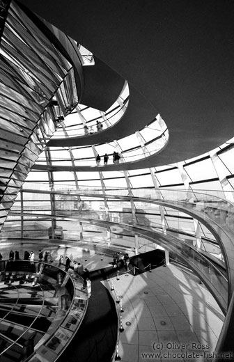 Walkways circle the central mirror construction