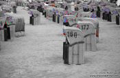 Travel photography:Tinted black and white image of beach baskets in Laboe, Germany