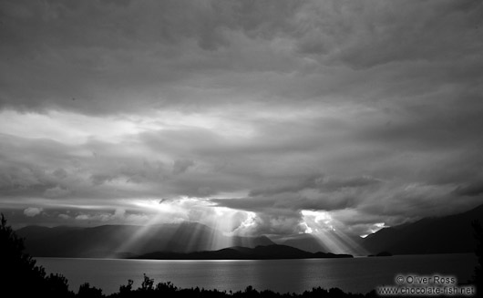 Rays of light break through the clouds in Fiordland National Park