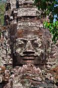 Travel photography:Stone face above the North Gate at Angkor Thom, Cambodia