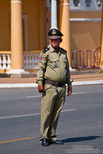 Traffic police outside the Phnom Penh Royal Palace 