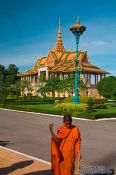 Travel photography:Buddhist monk visiting the Phnom Penh Royal Palace , Cambodia