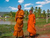 Travel photography:Two buddhist monk novices along the road between Sihanoukville and Kampott , Cambodia