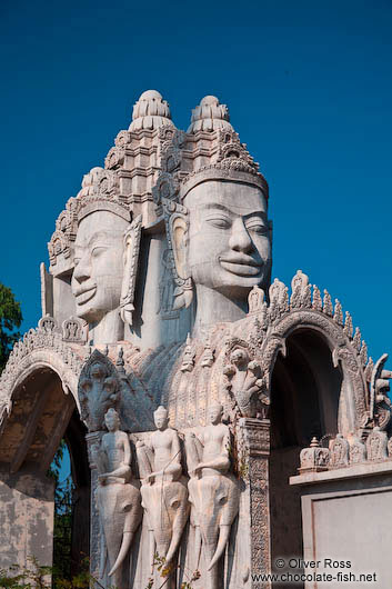 Giant faces above one of the entrance gates to the Vipassara Dhara Buddhist Centre near Odonk (Udong)