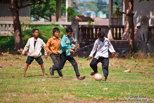 Kids playing football at a temple near Odonk (Udong) 