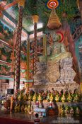 Travel photography:Giant green Buddha statue inside a temple at the Vipassara Dhara Buddhist Centre near Odonk (Udong), Cambodia