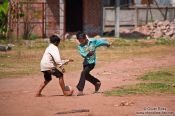 Travel photography:Kids playing football at a temple near Odonk (Udong) , Cambodia